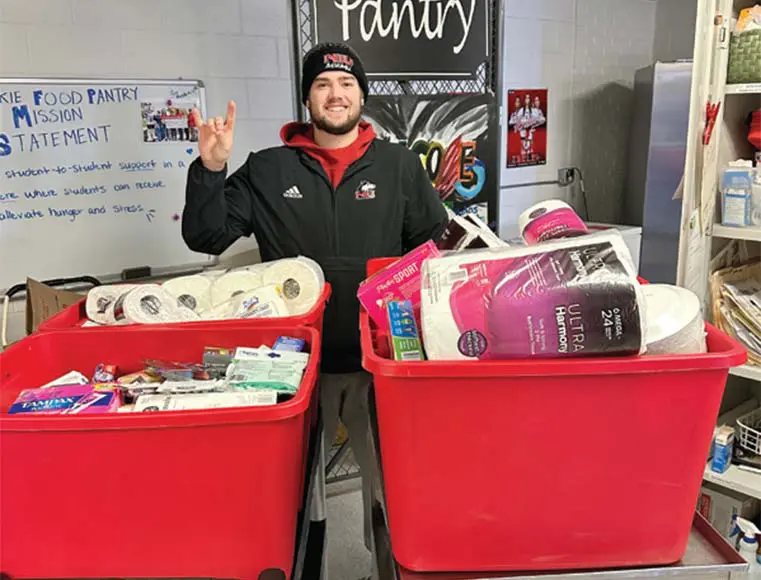 Two men giving thumbs up