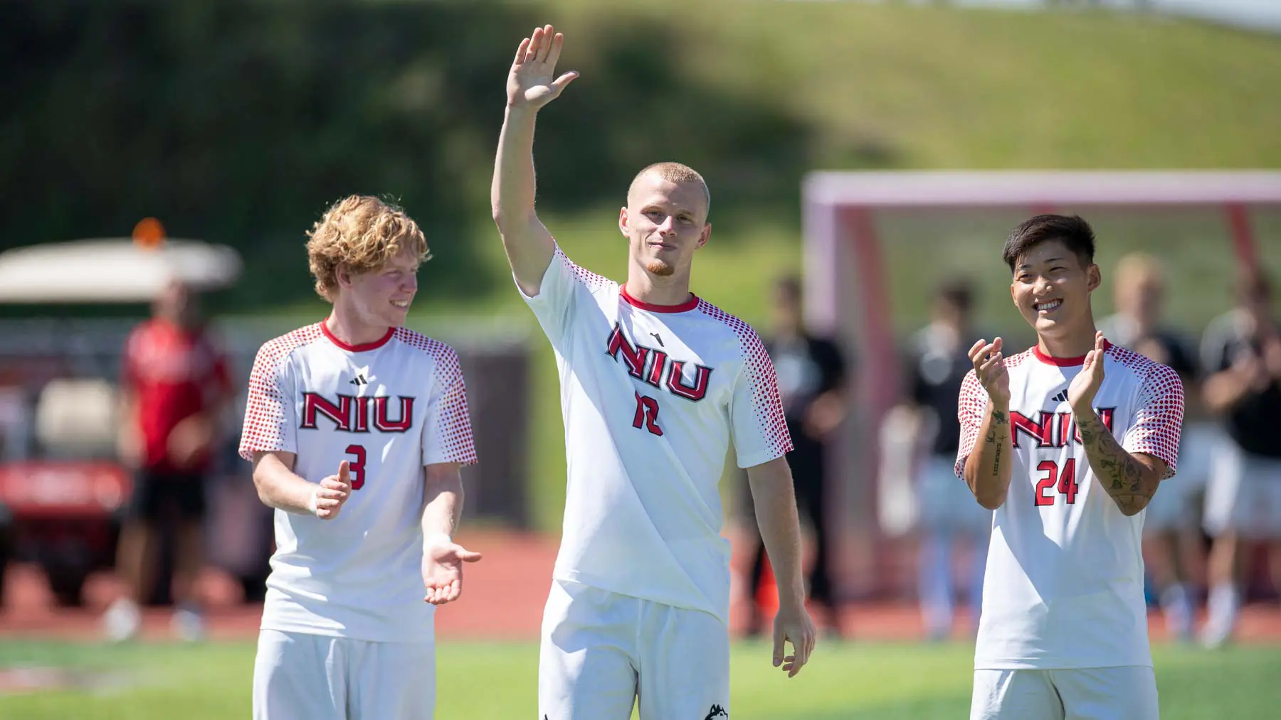 soccer players clapping